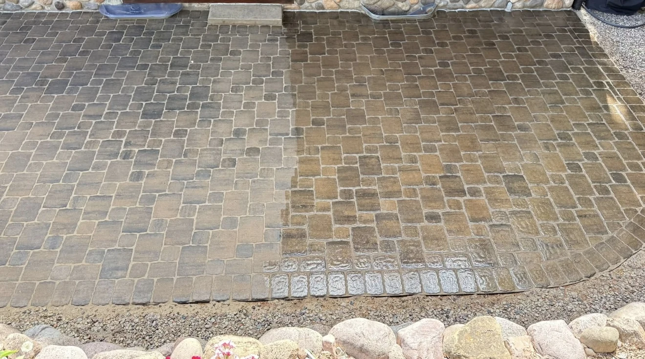 A close-up of paver surfaces showing different surface appearances